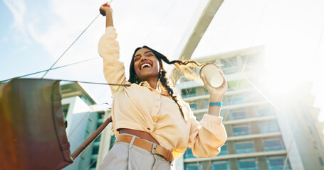 Excited, city and woman with coffee, cheering and fashion blogger in morning, outdoor or low angle....