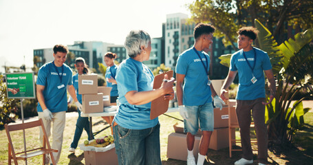 Charity, clipboard and teamwork with volunteer group outdoor in park for community food drive or...
