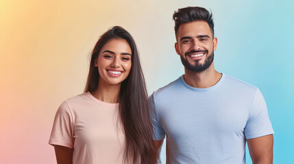 Fototapeta premium a beautiful young indian woman and a man standing confidently against a color background