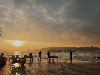 Fototapeta premium February 2023, Istanbul, Turkey. River transport trips. Morning on the Karakoy embankment.