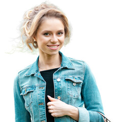 ortrait of young smiling attractive caucasian woman in jeans jacket in the park at summer