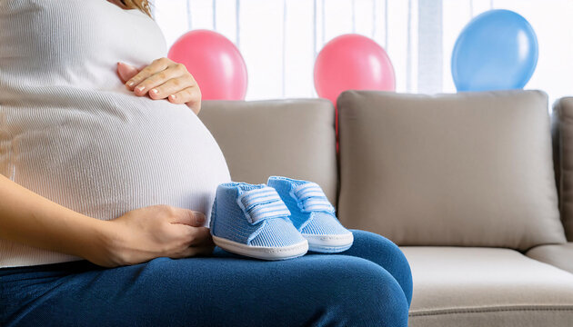 A pregnant woman lovingly cradles her baby bump while sitting on a couch, surrounded by blue and pink balloons, as she prepares to celebrate their new arrival