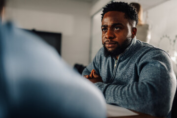 Focused businessman listening during a meeting in the office