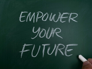 Empower your future, word text written on chalkboard, motivational inspirational quote