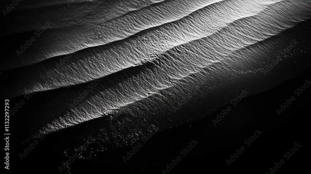 Poster a monochromatic image of gentle ocean waves, creating a serene and calming atmosphere.