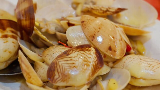 Lala clam stir fry with garlics and chillies