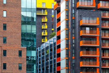 An eye-catching display of colorful modern buildings showcasing architectural innovation and urban lifestyle, set against a backdrop of contemporary city living in London UK