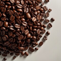 Obraz premium pile of dark coffee beans on white surface 