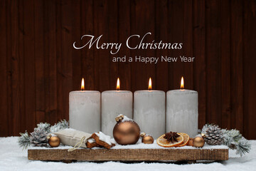 Merry Christmas and a Happy New Year. Christmas and New Year greetings. Arrangement with candles,...