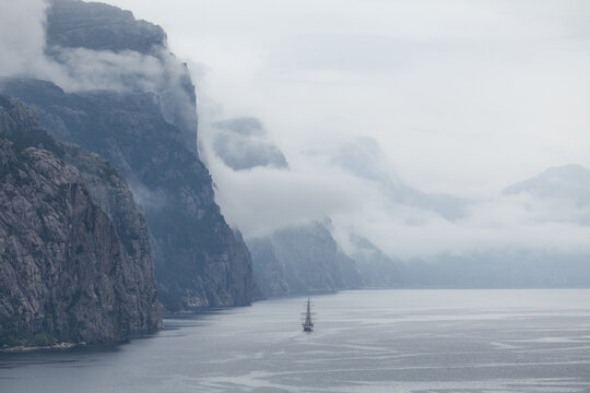 Utsiktspunkt H&oslash;llesli Lysefjorden in Norway. Sailing ship in the fjord.