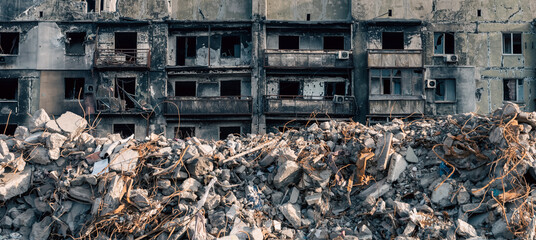 Fototapeta premium destroyed and burned houses in the city in Ukraine