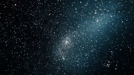 Obraz premium High-resolution image of the majestic night sky filled with countless sparkling stars twinkling against a deep black background, showcasing the infinite beauty of the universe and the cosmos.