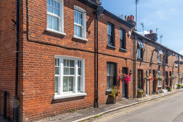 Row of terraced brick houses, in Marlow, Buckinghamshire, England, UK