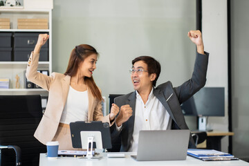 Happy smiling businessman feel happy work complete Teamwork success, success at work in the office concept.