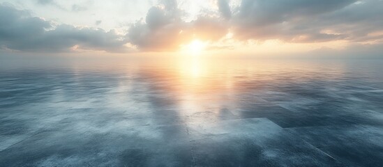 Obraz premium Serene sunset over calm ocean waters.