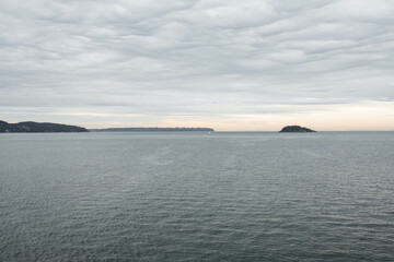 Obraz premium Vancouver island coastline, view from a ferry on the water