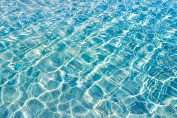 Obraz premium The sparkling, rippling surface of the water