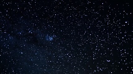 Obraz premium Enchanting night sky filled with sparkling stars illuminating a deep black background, perfect for astronomy, celestial themes, and starry night visuals