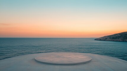 Serene helipad overlooking tranquil sea at sunset with clear skies and calm waters creating a peaceful coastal scene