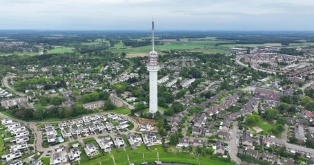 Radio and television tower Roermond, transmission tower broadcasting radio and television signals, data storage and telecommunications. Aerial overview.