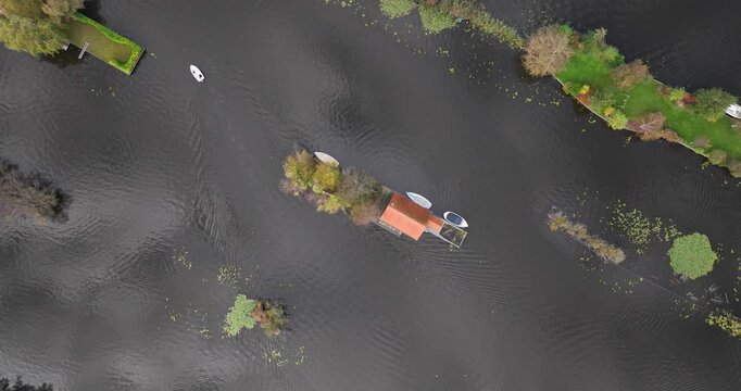 Small houses at the Loosdrechtse Plassen, Scheendijk, marina of Breukelen, The Netherlands, nature reserve with tow holes and legakkers