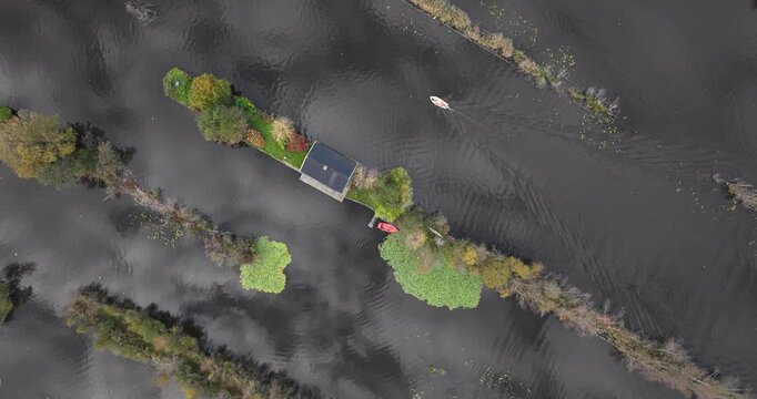Small houses at the Loosdrechtse Plassen, Scheendijk, marina of Breukelen, The Netherlands, nature reserve with tow holes and legakkers