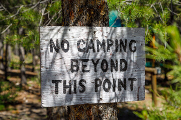 Road sign "No camping beyond this point"