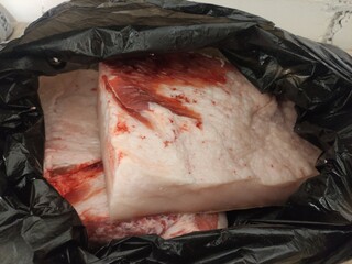 Pieces of lard in a bag in the kitchen