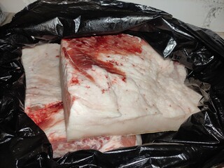 Pieces of lard in a bag in the kitchen