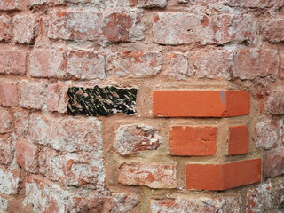 Iconic brick masonry in Stralsund's Old Town, showcasing ancient yet restored surfaces. A testament...