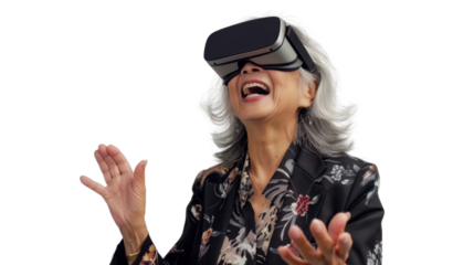 Asian caucasian senior businesswoman watching vr glasses laughing and gesturing with hand on white background
