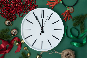 It's until midnight. Five to twelve. countdown to the last moments before Christmas or New Year. Concept: countdown until midnight. Christmas background. Accepting new fulfillments of dreams