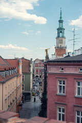 Obraz premium Narrow streets of Poznań leading to the Rynek square, showcasing the city's medieval charm