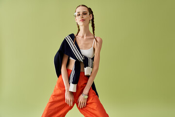 A young woman poses confidently in casual wear, radiating beauty despite her battle with anorexia.