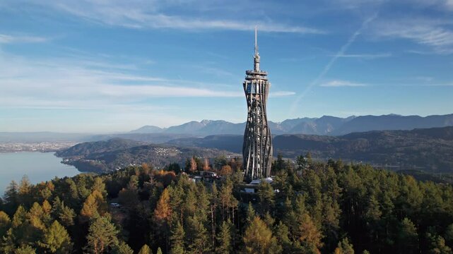 Aerial view of wooden observation tower on Pyramidenkogel mountain over of Worthersee lake, Carinthia, Austria