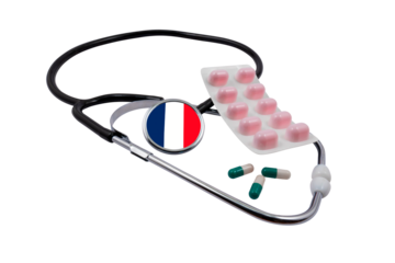 Medical stethoscope with a head in the shape of the French flag and pills on a transparent background. Concept of medical diagnostics and the French healthcare system