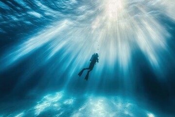 Diver Exploring Underwater World with Beautiful Sun Rays Illuminating Ocean Water, Creating a Serene and Tranquil Atmosphere Beneath the Waves