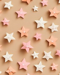 Obraz premium Colorful paper stars in pink and white arranged on a beige background, creating a whimsical and festive atmosphere.