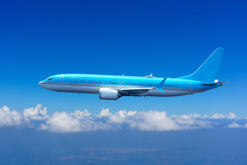 Obraz premium Passenger plane flies and gains altitude through the clouds