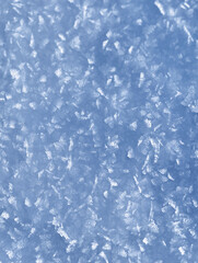 Fototapeta premium Background of winter ice and snow texture. Ice covered by frost naturl background