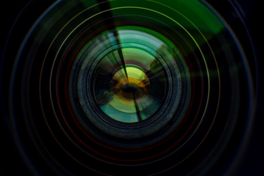 Fototapeta Macro camera lens glass,Camera lens on blur night city,Photo Camera or Video lens close-up on black background, objective, concept of photographer camera man job, looking for a photographer,