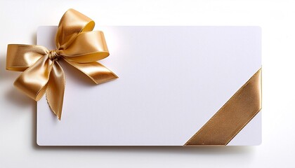 A white clear paper card with a gold ribbon bow on a side on white background