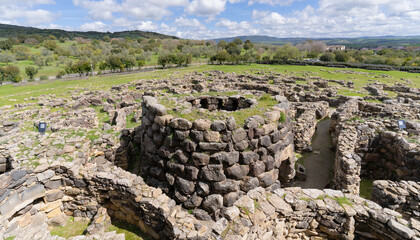 Ancient megalithic edifice of nuragic civilization, dating back to the bronze age, stands majestically against a vibrant sky