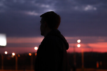 silhouette of a person in the sunset