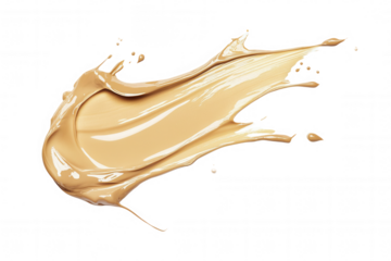 A smooth, creamy swatch of beige foundation spread out on a transparent surface showcases its rich texture. The streak exhibits the foundations consistency and color, ideal for makeup application or c