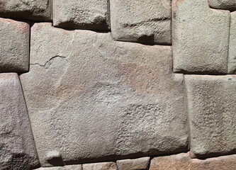 Closeup of a multi sided stone in an Inca building, Cusco Peru
