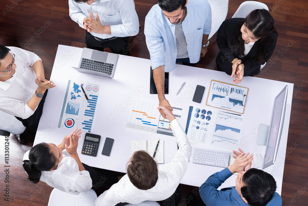 Aufkleber top view diverse office employee worker shake hand after making agreement on strategic business mark