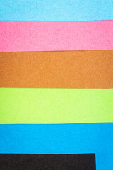 Fototapeta premium Multi color background from a paper of different colors. Abstract colorful vibrant paper textures.