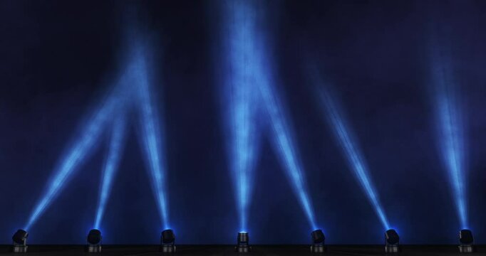 Blue stage lights with fog and smoke. Looping animation. 3D render.
