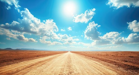 Fototapeta premium Scenic Dirt Road Winding Through the Hajar Mountains of Dubai, UAE: A Breathtaking Emirati Landscape Under Bright Blue Skies with Beautiful Clouds